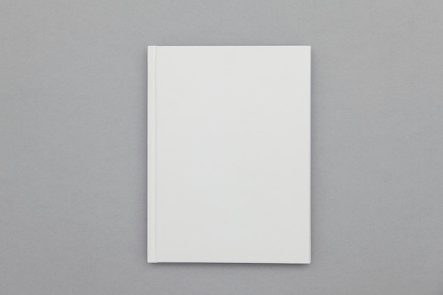 Gebundenes Buchcover Mockup Weißes Buch auf grauem Hintergrund