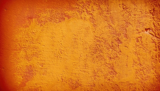 Gelb-orange-rote Grunge-Textur. Getönte raue Wandoberfläche