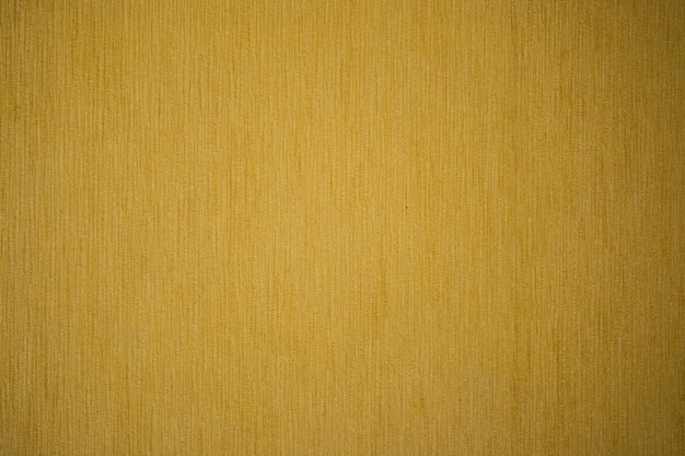 gelbe abstrakte Textur einer Wand