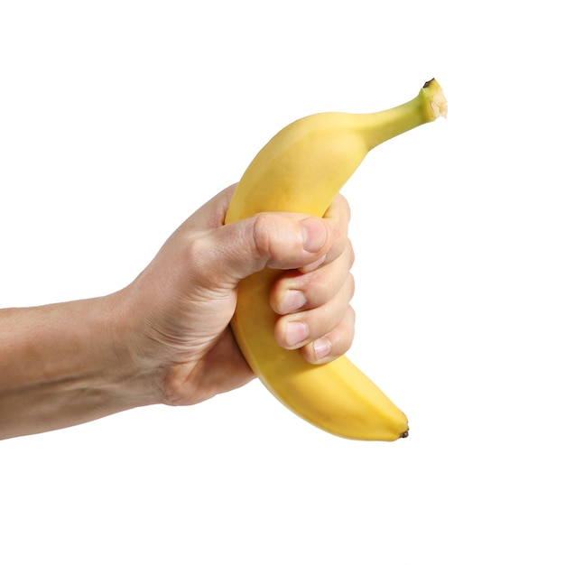 Gelbe Banane in der Hand auf weißem Hintergrund