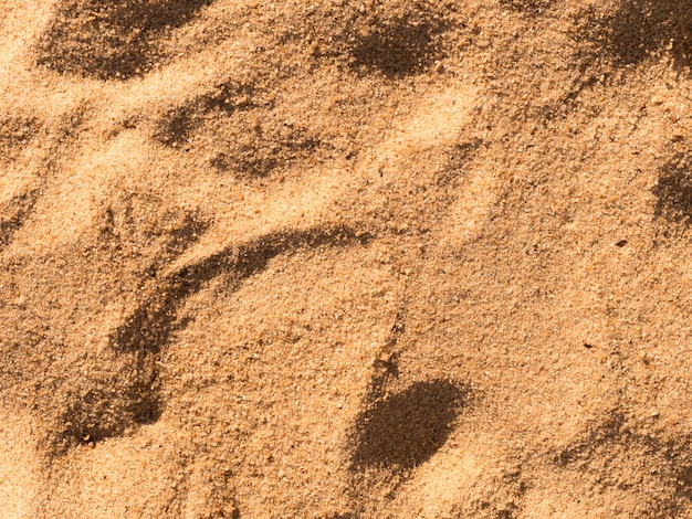 Gelber Sand. Draufsicht über Beschaffenheit des Sandes vom Strand