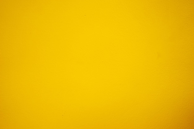 Foto gelber zementboden, helle schattenfarbe.
