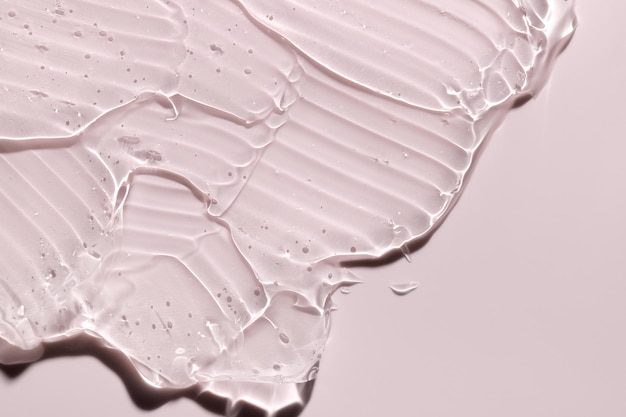 Gelo líquido transparente Textura del producto cosmético para el cuidado de la piel Crema facial muestra de deslizamiento