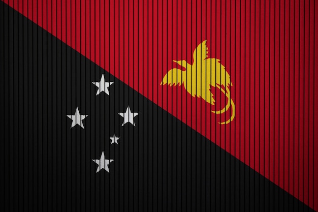 Gemalte Staatsflagge von Papua-Neu-Guinea auf einer Betonmauer