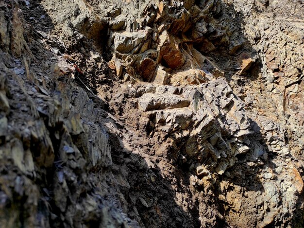 Geodäsie Steinstruktur Der Stein ist braun und rot Mineralischer Hintergrund Design aus natürlichen Materialien