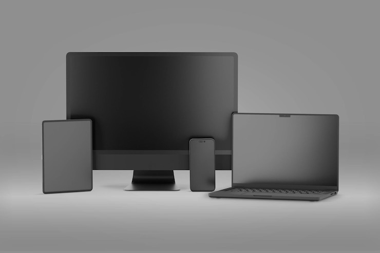 Foto geräte mit telefon, computer, laptop und tablet