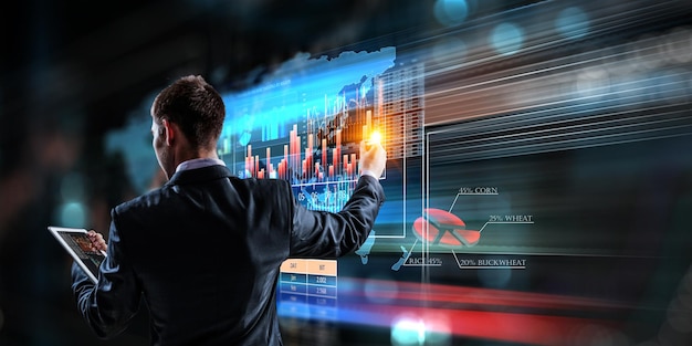 Geschäftsdiagramm und Handelsmonitor. Gemischte Medien