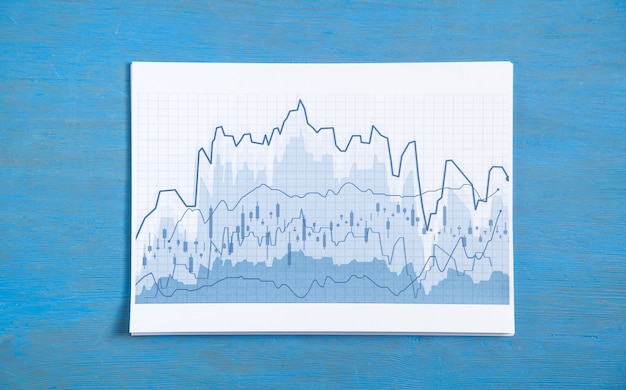 Geschäftsdiagramme auf blauem Hintergrund