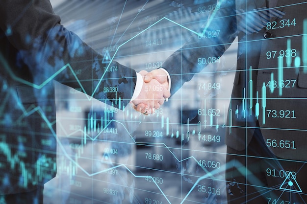 geschäftsmänner, die hände auf abstrakter glühender forex-diagrammkarte rütteln