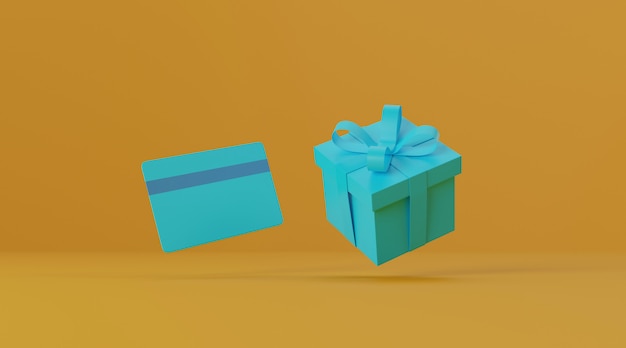 Geschenkbox und Kreditkarte auf gelbem Hintergrund.