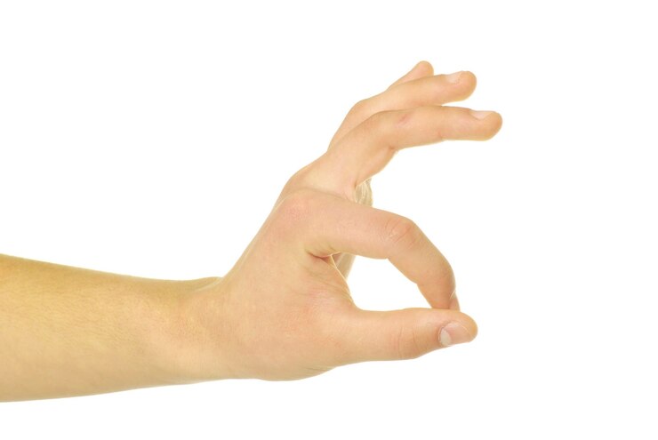 Foto gesto de la mano sobre fondo blanco.