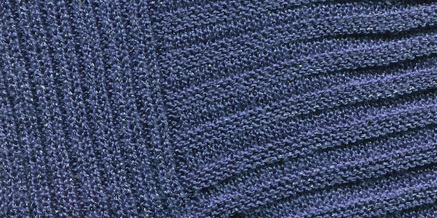 Gestrickte blaue Texturoberfläche Nahaufnahme Hintergrund aus weicher blauer Decke