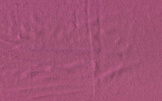 Gestrickte lila Textur Oberfläche Nahaufnahme Hintergrund von Weichheit lila Decke