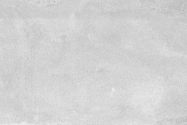 Gips-Betonwand mit Stucktextur im Hintergrund