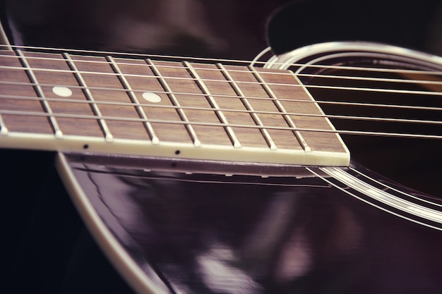 Gitarrenakustik im Vintage-Stil Nahaufnahme Foto