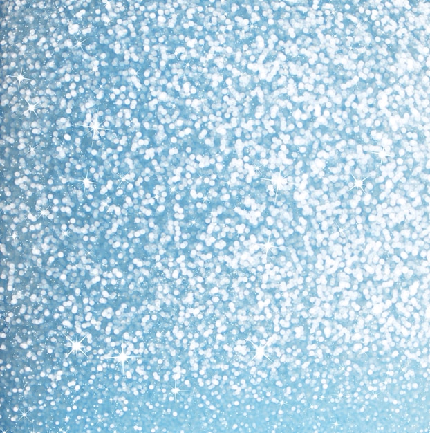 Glänzende Lichter. abstrakter silberblauer Hintergrund mit Sternen und fallendem Schneeeffekt