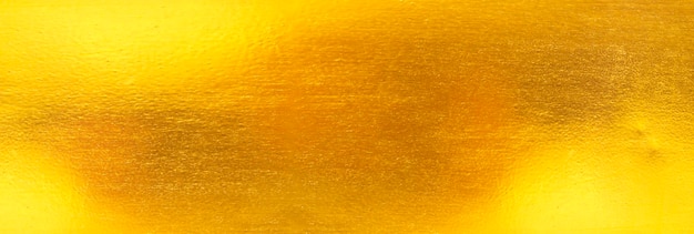 Glanzende gelbe Blatt-Goldfolie-Textur