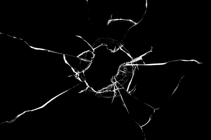 Glasbruch von einer Kugel Textur von gebrochenem Glas