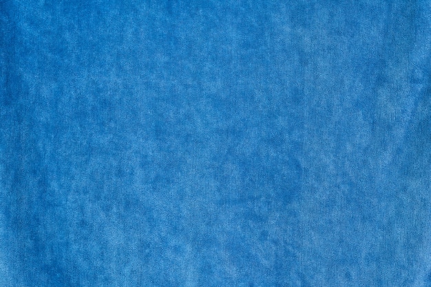 Glatte Denimhintergrund-Gewebebeschaffenheit. Dunkelblaue Farbe