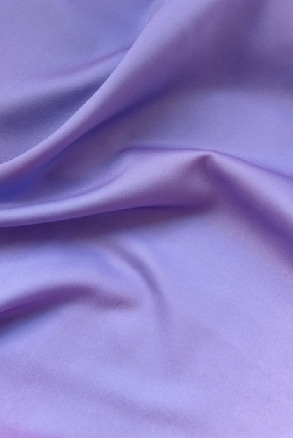 Glatte elegante lila Seide oder Satin Textur. Luxuriöses Hintergrunddesign