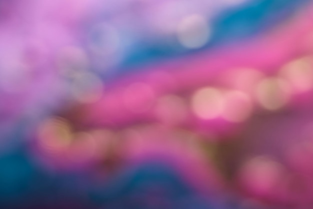 Glatter Hintergrund mit Farbverlauf mit rosa, türkisfarbenen und gelben Farben Verschwommene Abstraktion