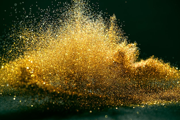 Glitter Bombs Grunge, Goldglitter defokussiert abstrakte Twinkly Lights Hintergrund.