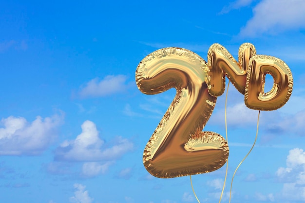 Foto globo de cumpleaños de lámina de oro número 2 contra un cielo azul brillante de verano celebración de la fiesta de oro representación 3d