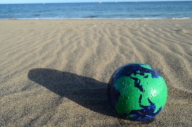 Globo Terra na praia