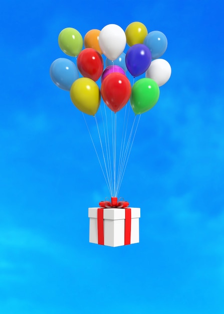 Foto globos con caja de regalo en el fondo de cielo azul