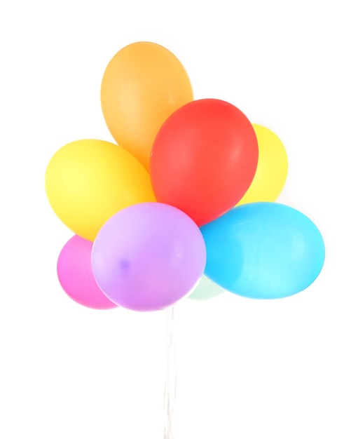 Globos de colores en mano aislados en blanco