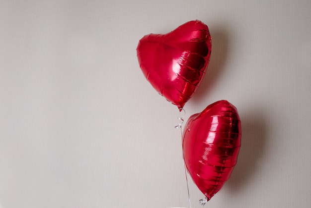 Globos rojos en forma de corazón