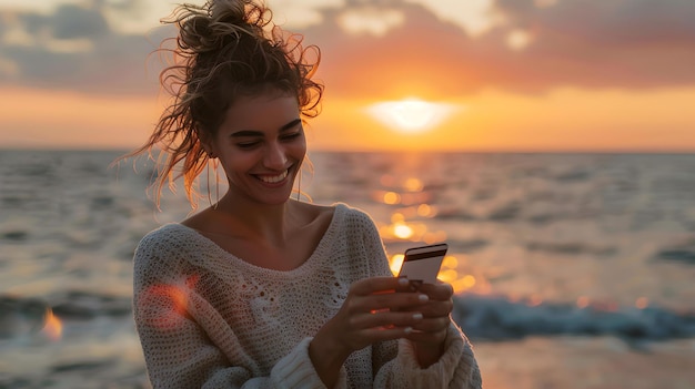 Glückliche junge Frau genießt den Sonnenuntergang am Strand mit Smartphone in der Hand, umarmt die Natur, Schönheit, Casual-Lebensstil, KI