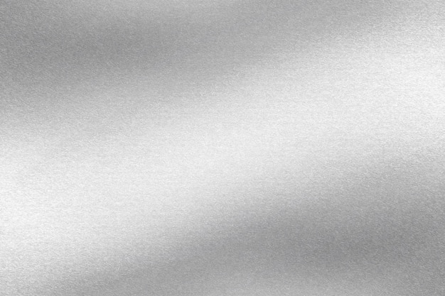 Foto glühende polierte silberne stahlwellenpanel abstrakte texturhintergrund