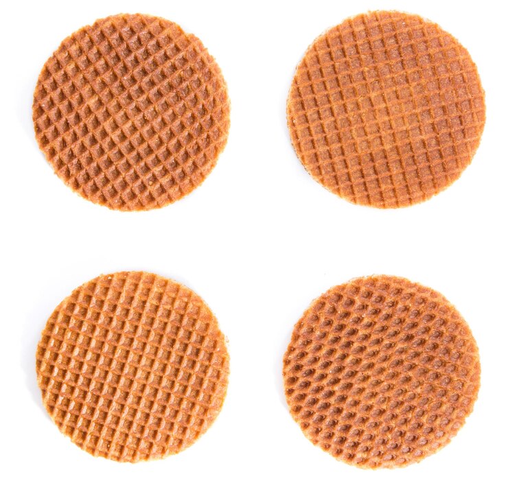 Foto gofres rellenos de miel aislado en blanco