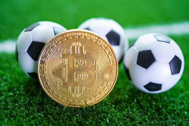 Gold-Bitcoin mit Fußball oder Fußball-Kryptowährung, die bei Online-Sportwetten verwendet wird