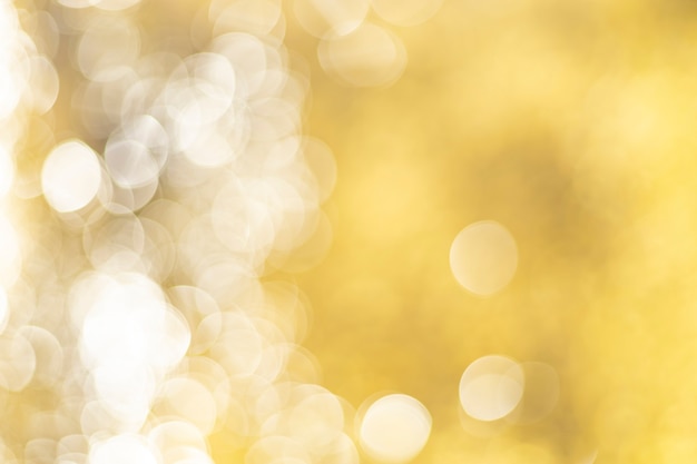 Gold Bokeh heller abstrakter Hintergrund