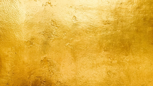 Foto gold glänzende wand abstrakte hintergrundtextur schönes luxus und eleganz