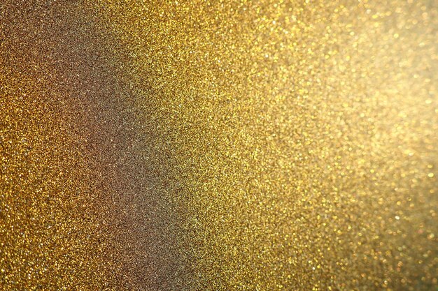 Gold Nahaufnahme Goldener Glitzer Textur Hintergrund Funkelndes Glitzer Geschenkpapier mit Pailletten und funkelt Festliches goldenes Bokeh und Glitzer Schöner Hintergrund Bokeh-Licht aus Gold glänzt