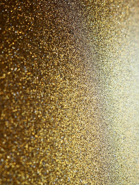 Gold Nahaufnahme Goldener Glitzer Textur Hintergrund Funkelndes Glitzer Geschenkpapier mit Pailletten und funkelt Festliches goldenes Bokeh und Glitzer Schöner Hintergrund Bokeh-Licht aus Gold glänzt