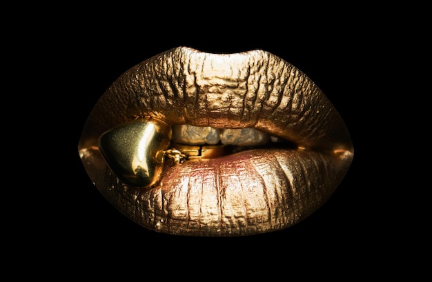 Gold sexy weibliche Lippen schöne Lippen Schönheit goldene Frau Mund Schmuck Konzept