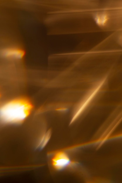 Goldene Feuerunschärfe funkelt Glitzerlichter abstraktes Bokeh auf schwarzem Hintergrund