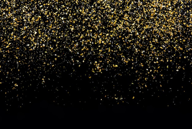 Goldene Glitzerbeschaffenheit auf schwarzer abstrakter Wand