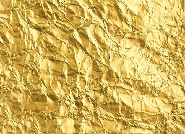 Goldener Betonfolienpapier-Texturhintergrund