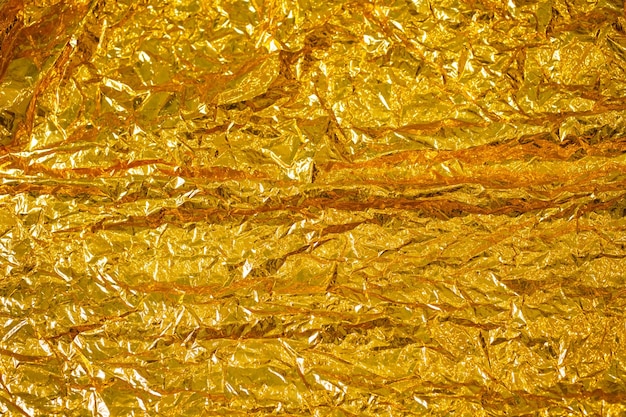 Goldfolie abstrakte zerknitterte Textur aus nächster Nähe