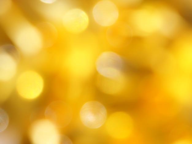 Goldgelbes Bokeh-Hintergrundbild zum Erstellen von Hintergrundbildern.