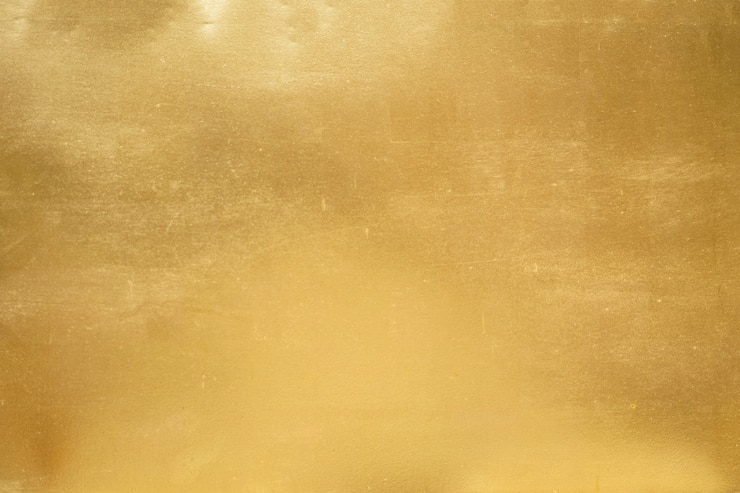 Foto goldhintergrund oder -beschaffenheits- und -verläufeschatten.