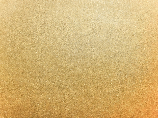 Goldpapier-Textur-Hintergrund. Flache Lage