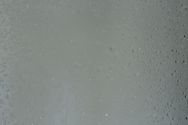 gotas abstratas fundo de vidro / chuva de nevoeiro de textura, fundo sazonal, vidro transparente com água