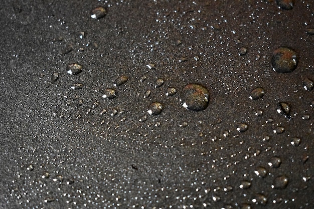 Foto gotas de aceite en el metal