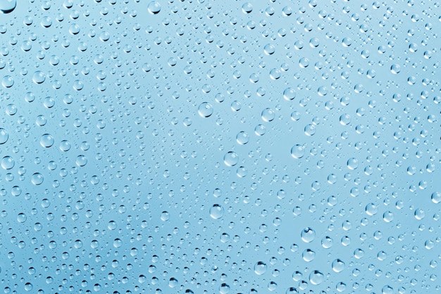 Gotas de agua abstracta fondo azul claro